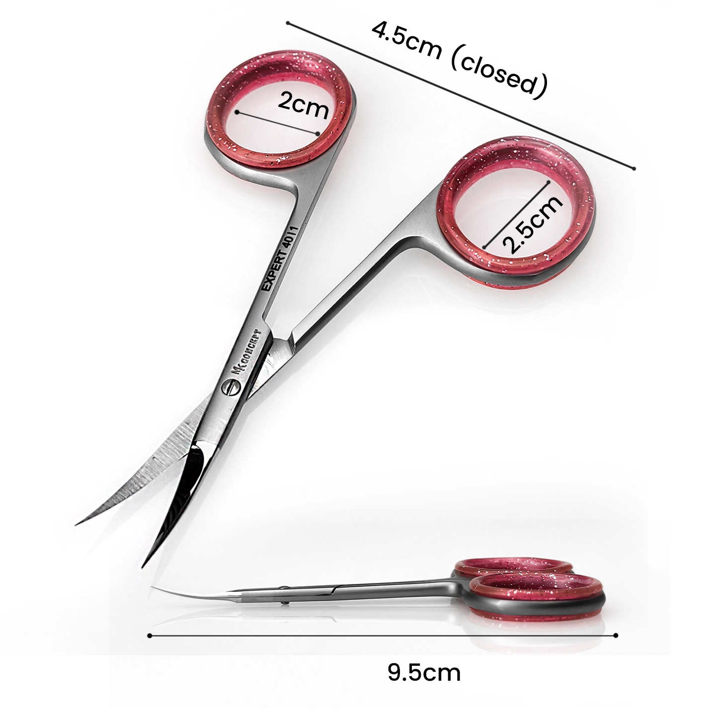 Hand holding MK Concept curved cuticle scissors with pink grip